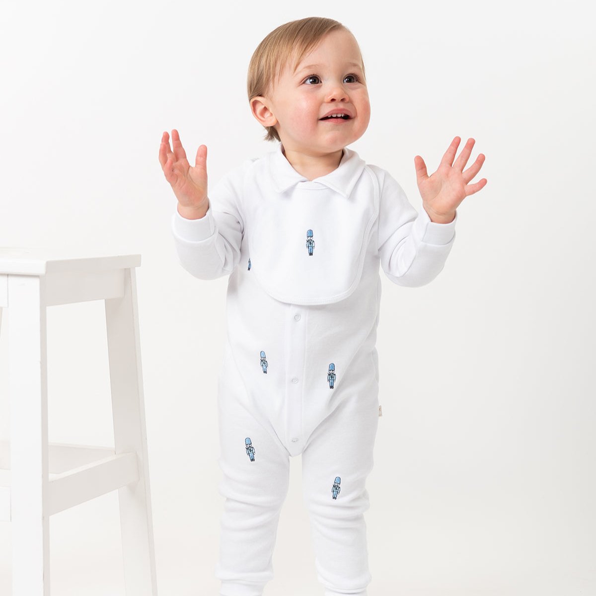 Caramelo Kids Boys White Soldier Babygrow with Bib Caramelo Kids Boys White Soldier Babygrow with Bib